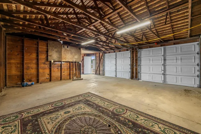 a view of a room with wooden walls