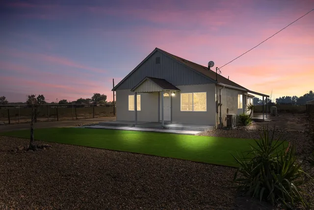 a view of swimming pool with a yard