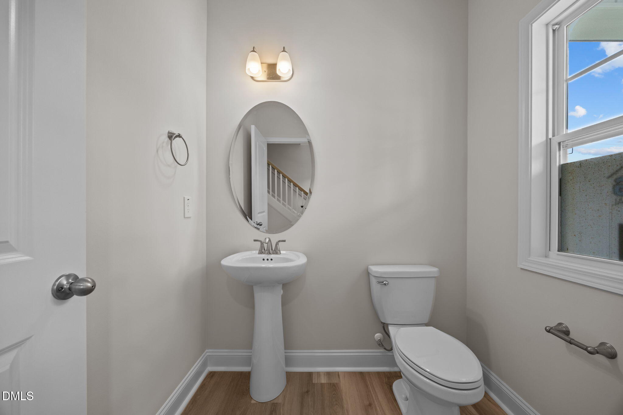 205 Regis Lane, Unit 11 Coats, NC 27521 - Photo 15 of 37 a bathroom with a toilet