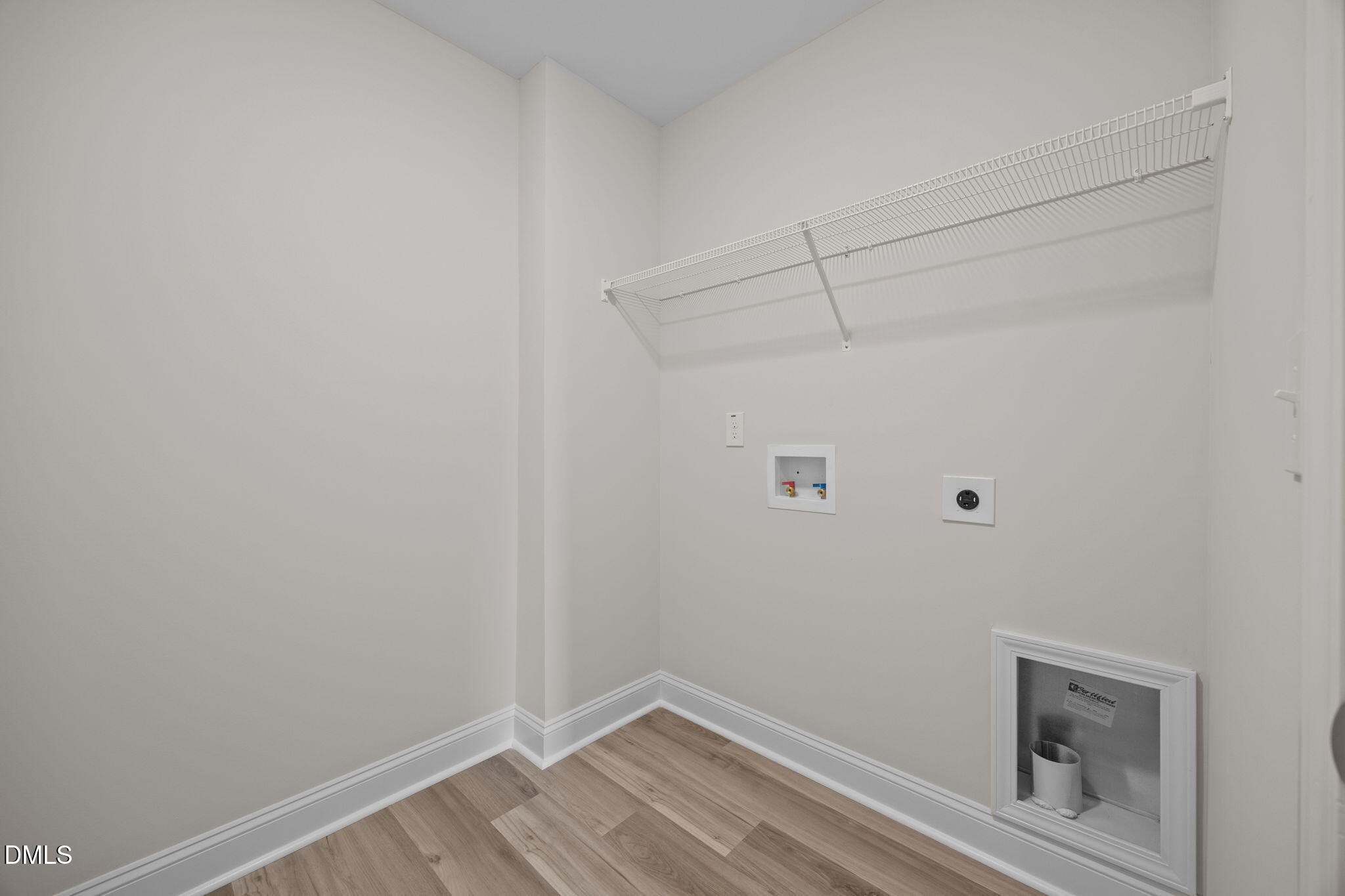 205 Regis Lane, Unit 11 Coats, NC 27521 - Photo 25 of 37 a view of small space with empty racks on the wall