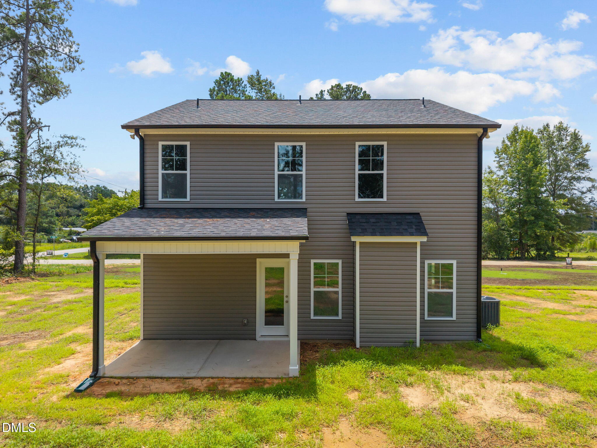 205 Regis Lane, Unit 11 Coats, NC 27521 - Photo 32 of 37 a view of a house with a swimming pool