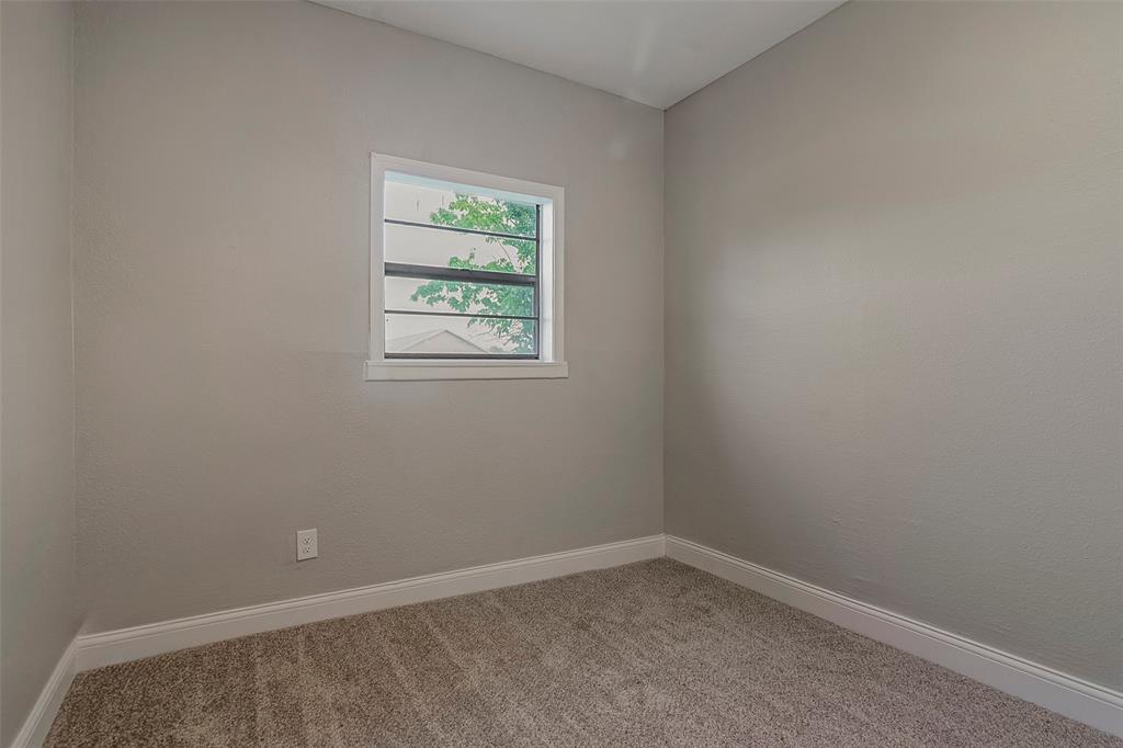 306 North Front Street Savoy, TX 75479 - Photo 16 of 27 an empty room with a window