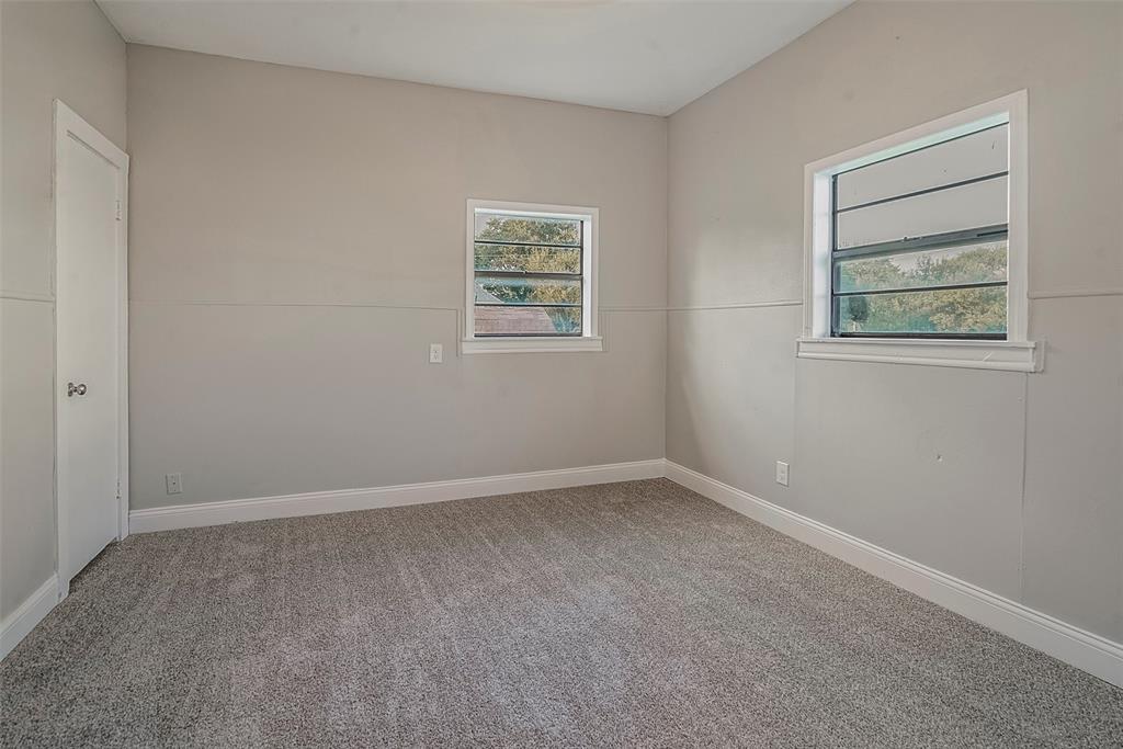 306 North Front Street Savoy, TX 75479 - Photo 23 of 27 an empty room with windows