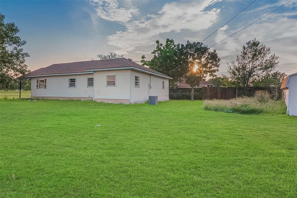 306 North Front Street Savoy, TX 75479 - Photo 26 of 27 a view of a house with a yard