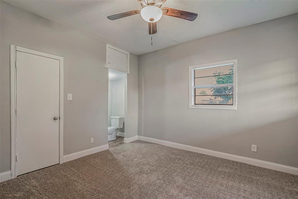 306 North Front Street Savoy, TX 75479 - Photo 9 of 19 a view of an empty room with a chandelier fan