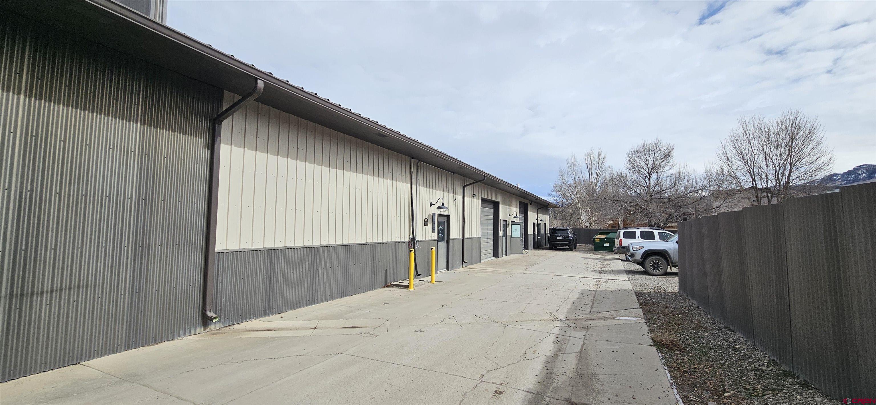 158 Liddell Drive, Unit B Ridgway, CO 81432 - Photo 11 of 11 a view of a house with a snow in a yard