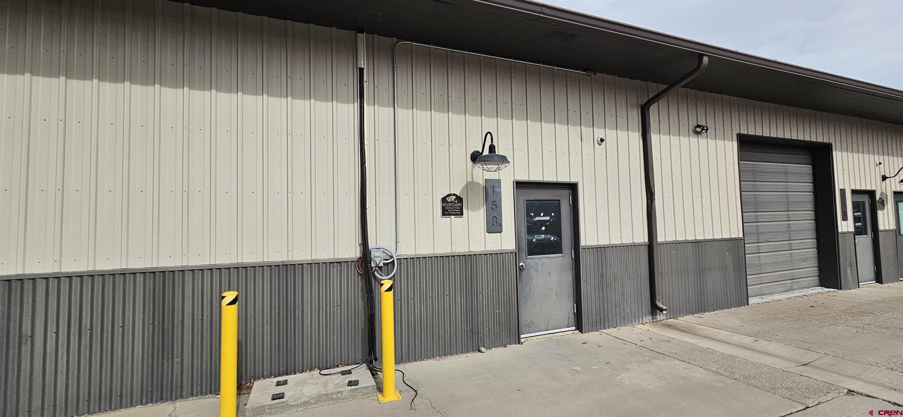 158 Liddell Drive, Unit B Ridgway, CO 81432 - Photo 2 of 11 a bedroom with a bed and a dresser