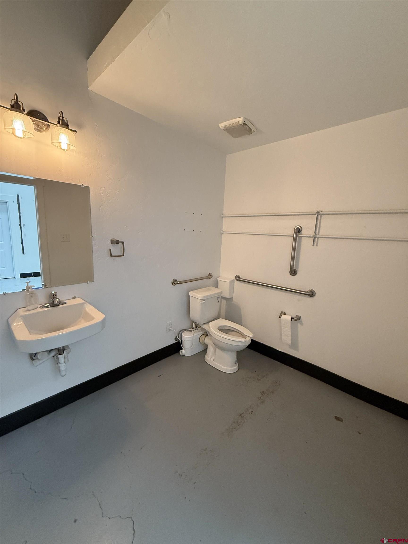 158 Liddell Drive, Unit B Ridgway, CO 81432 - Photo 10 of 11 a bathroom with a sink and a mirror