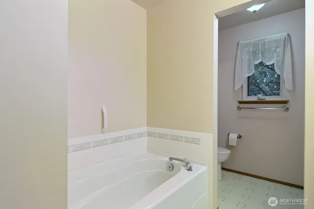 a bathroom with a bathtub