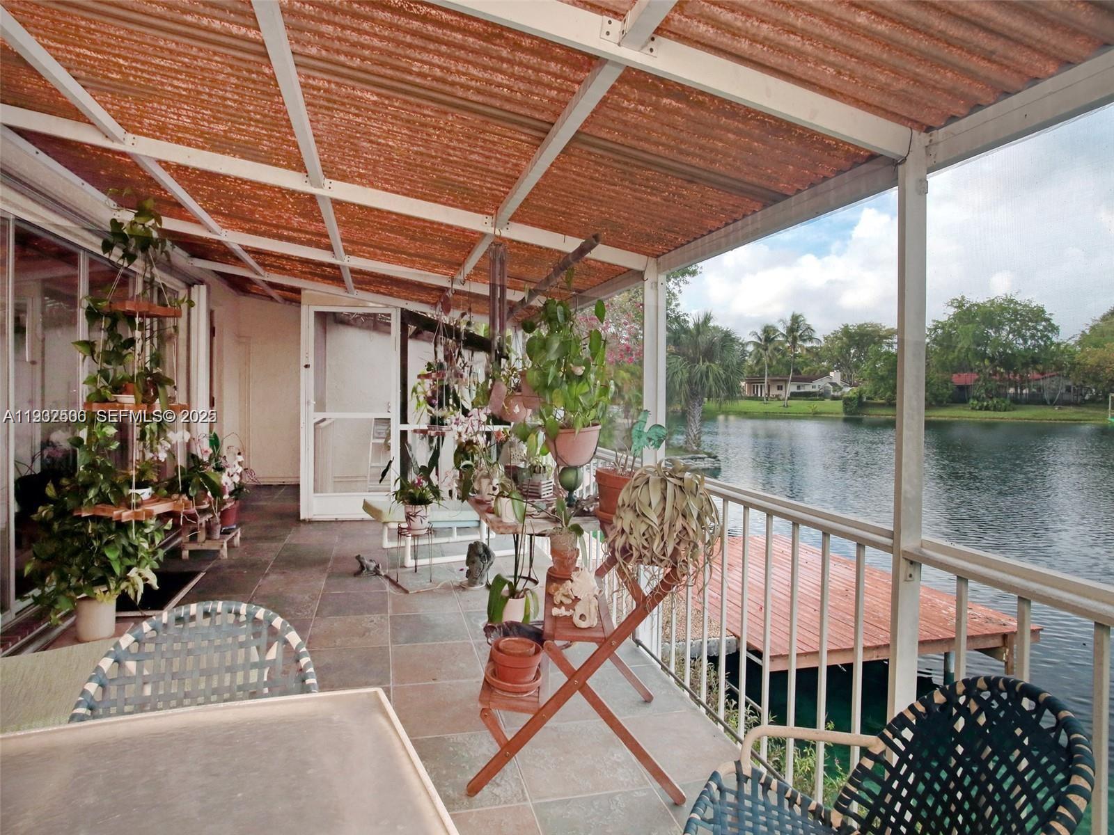 6918 Holly Road Miami Lakes, FL 33014 - Photo 10 of 10 a view of a balcony with chairs