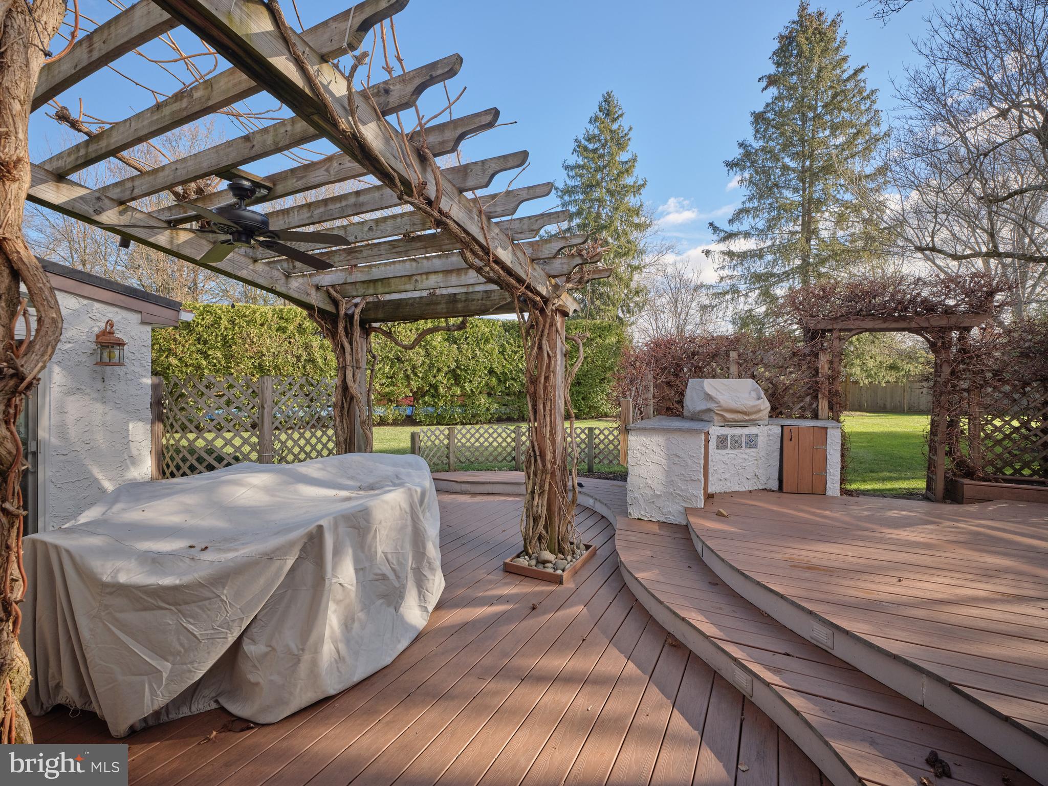14 Jonathan Way Washington Crossing, PA 18977 - Photo 39 of 58 Outdoor Dining with Trumpet Vine covered pergola