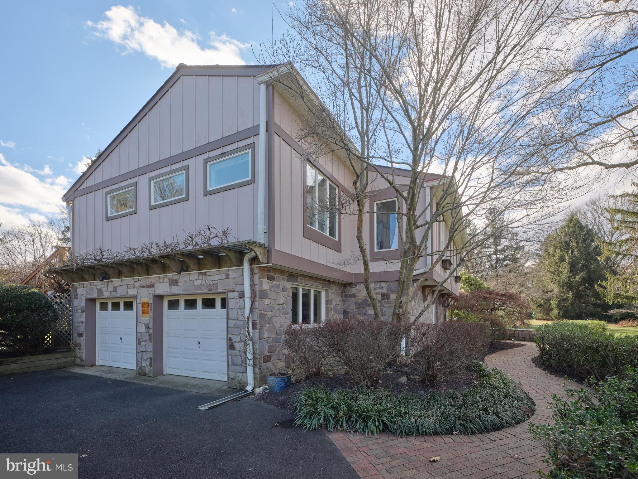 14 Jonathan Way Washington Crossing, PA 18977 - Photo 58 of 58 2 car garage with wisteria-covered trellis