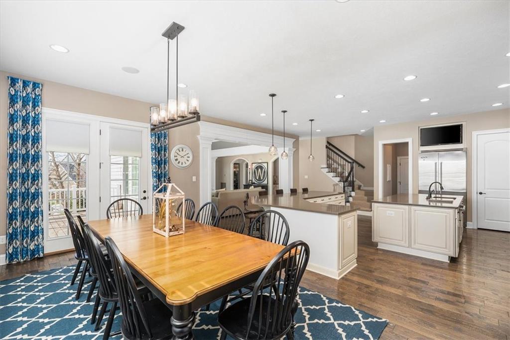 102 Minnock Drive Mars, PA 16046 - Photo 13 of 50 a view of a dining room and livingroom with furniture wooden floor a chandelier