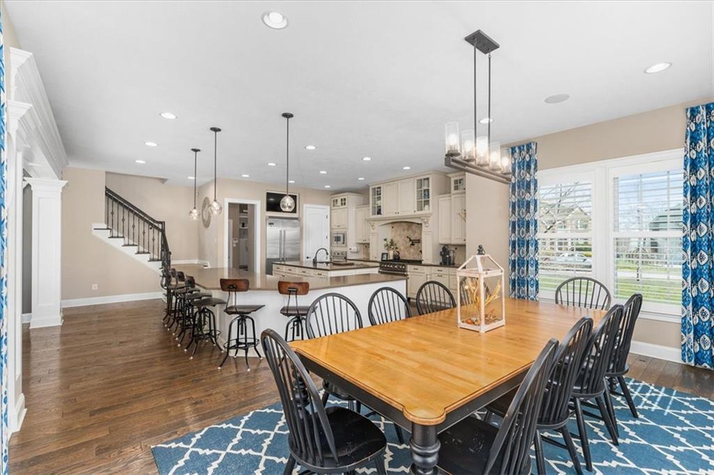 102 Minnock Drive Mars, PA 16046 - Photo 14 of 50 a dining room with furniture a chandelier and wooden floor