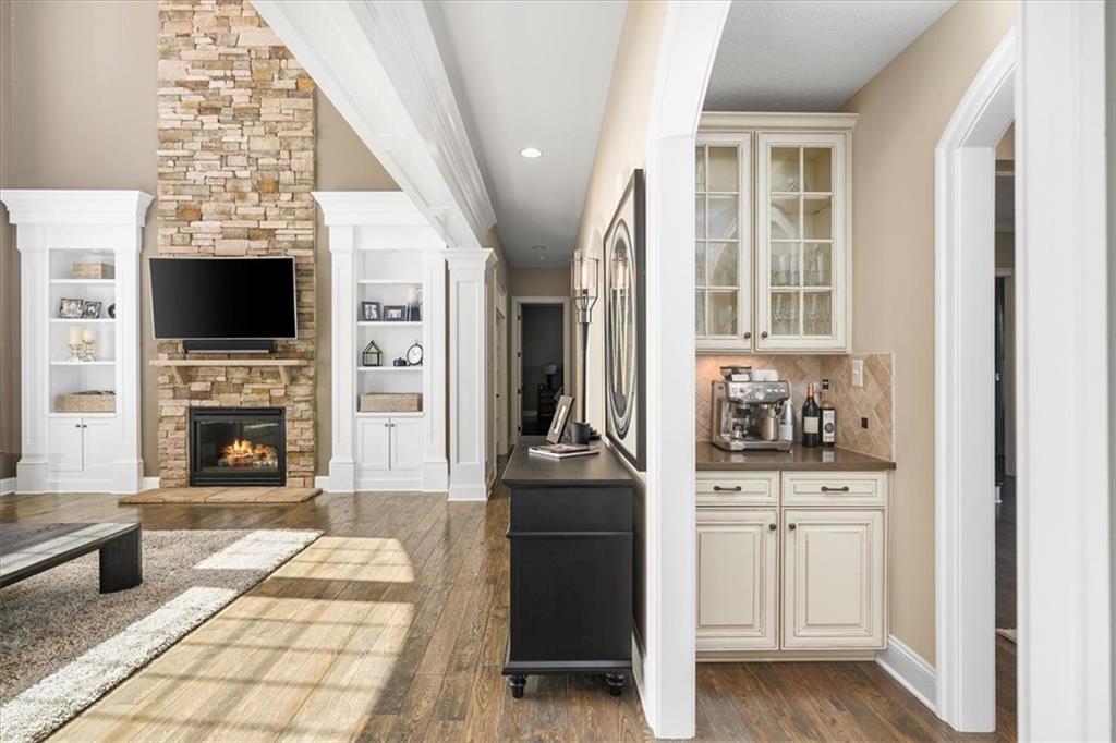 102 Minnock Drive Mars, PA 16046 - Photo 18 of 50 a living room with fireplace furniture and a flat screen tv
