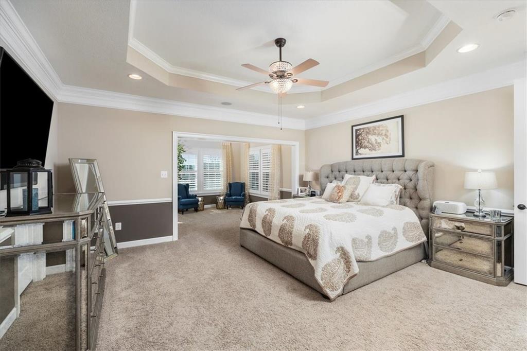 102 Minnock Drive Mars, PA 16046 - Photo 24 of 50 a spacious bedroom with a bed and a flat screen tv