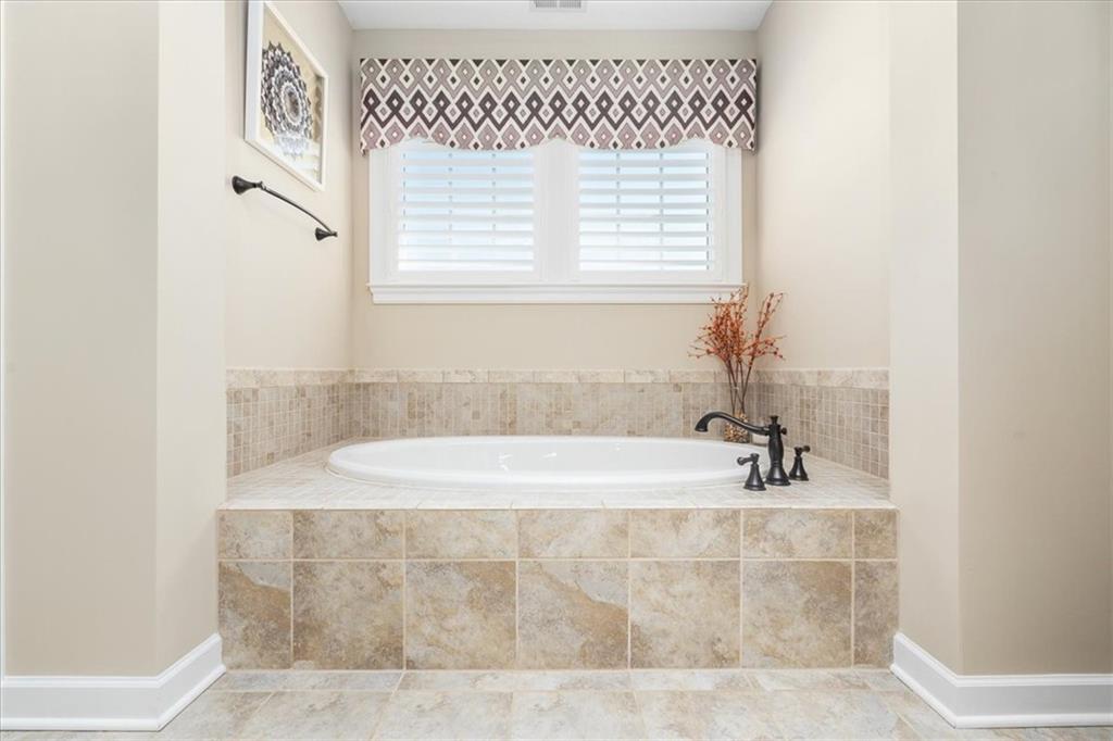 102 Minnock Drive Mars, PA 16046 - Photo 30 of 50 a bathroom with a bathtub and a shower