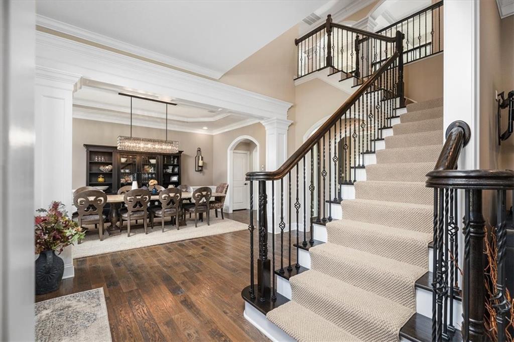 102 Minnock Drive Mars, PA 16046 - Photo 3 of 50 a view of a hallway with wooden floor and stairs