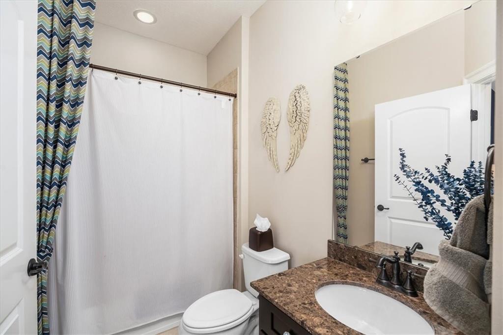 102 Minnock Drive Mars, PA 16046 - Photo 33 of 50 a bathroom with a granite countertop sink mirror vanity and toilet