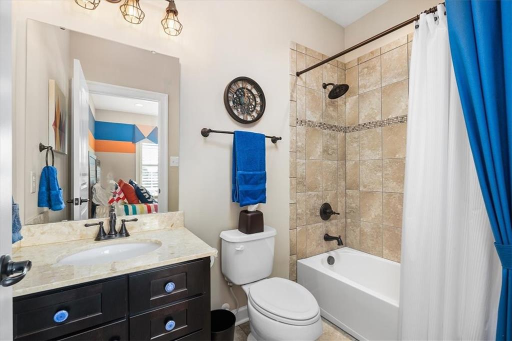 102 Minnock Drive Mars, PA 16046 - Photo 35 of 50 a bathroom with a bathtub a sink and a large mirror