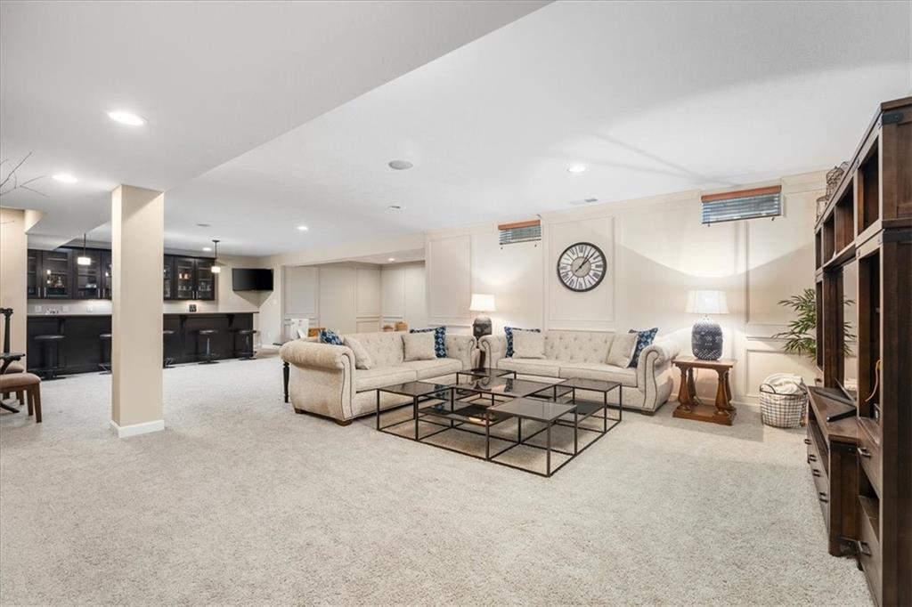 102 Minnock Drive Mars, PA 16046 - Photo 39 of 50 a living room with furniture and a flat screen tv