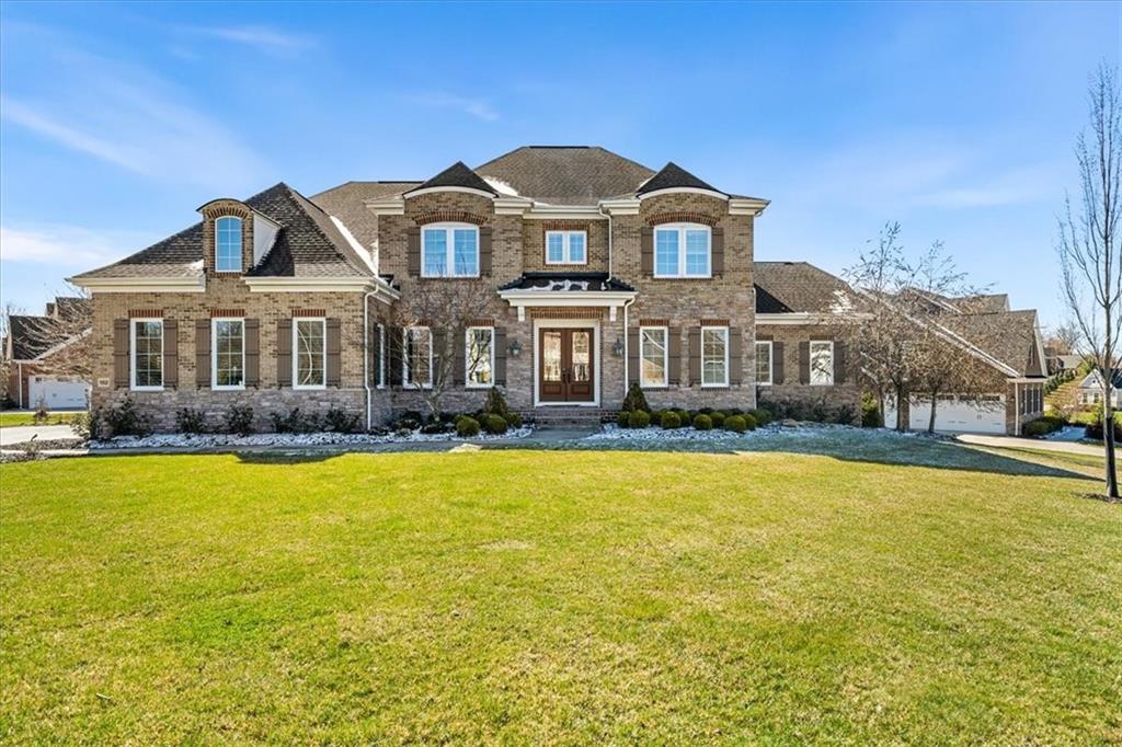 102 Minnock Drive Mars, PA 16046 - Photo 45 of 50 a front view of a house with swimming pool