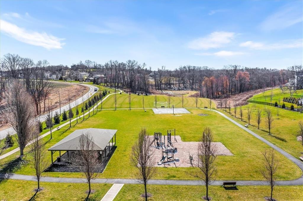102 Minnock Drive Mars, PA 16046 - Photo 50 of 50 a view of a swimming pool with seating area