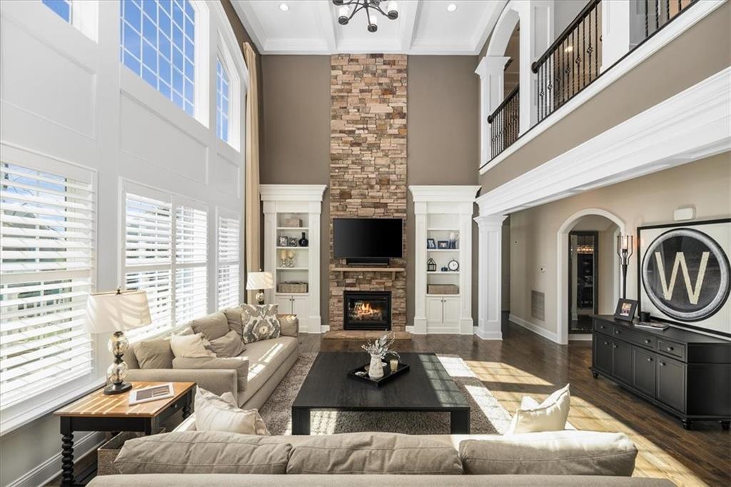 102 Minnock Drive Mars, PA 16046 - Photo 8 of 50 a living room with furniture a fireplace and a flat screen tv