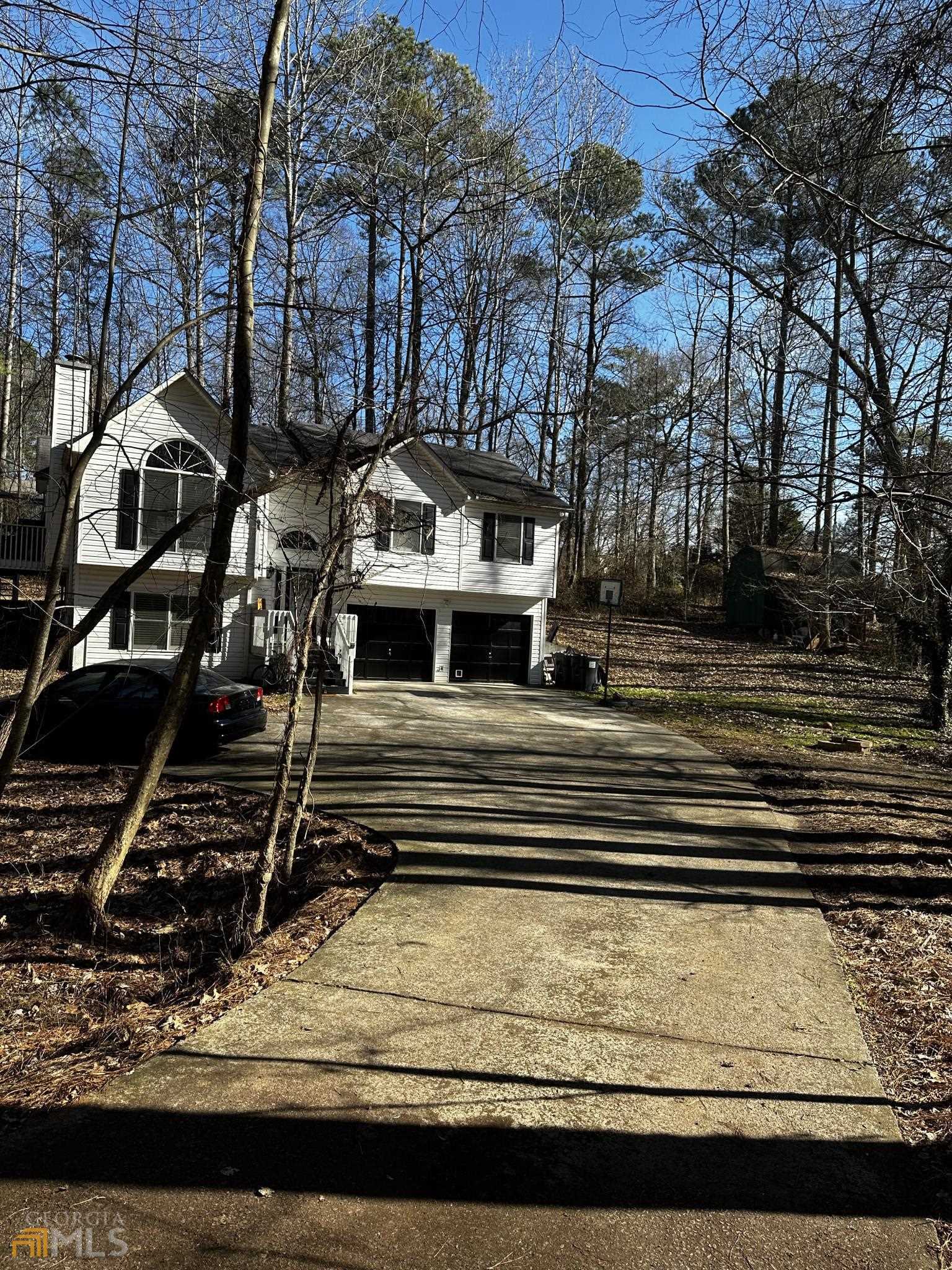 171 Clyde Cole Road Dallas, GA 30157 - Photo 1 of 1 a view of a yard with large trees