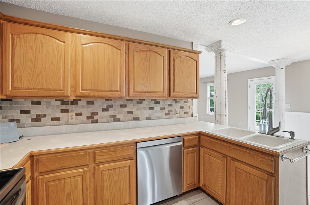 1208 Jarva Lane Springboro, OH 45066 - Photo 26 of 75 This bright kitchen features ample cabinetry and modern appliances, perfect for everyday living.