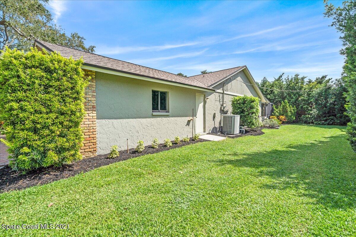 3780 Laurette Road Merritt Island, FL 32952 - Photo 34 of 46 Side Yard 2