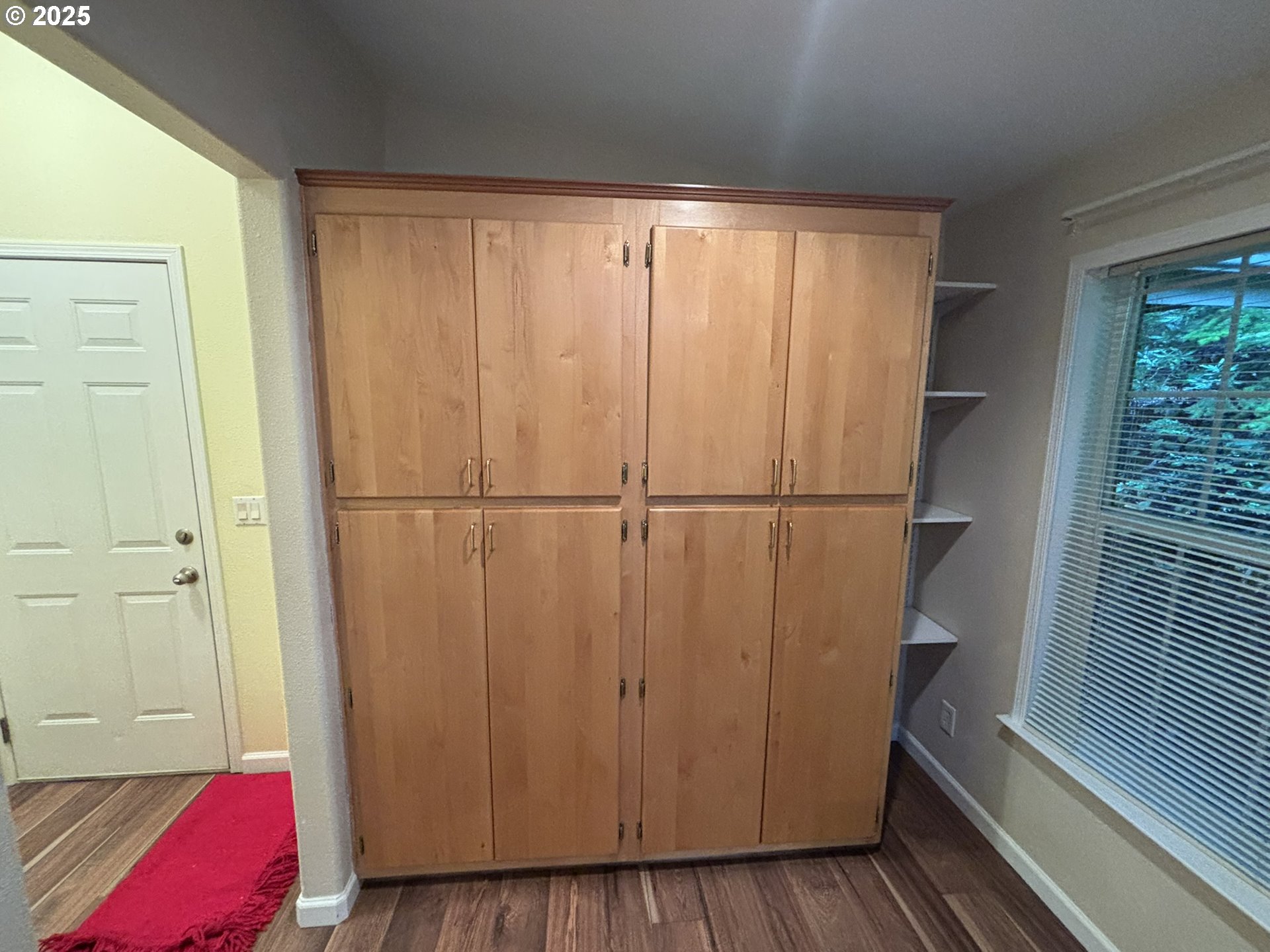 325 Jonathan Lane Florence, OR 97439 - Photo 11 of 37 a view of a closet with wooden floor