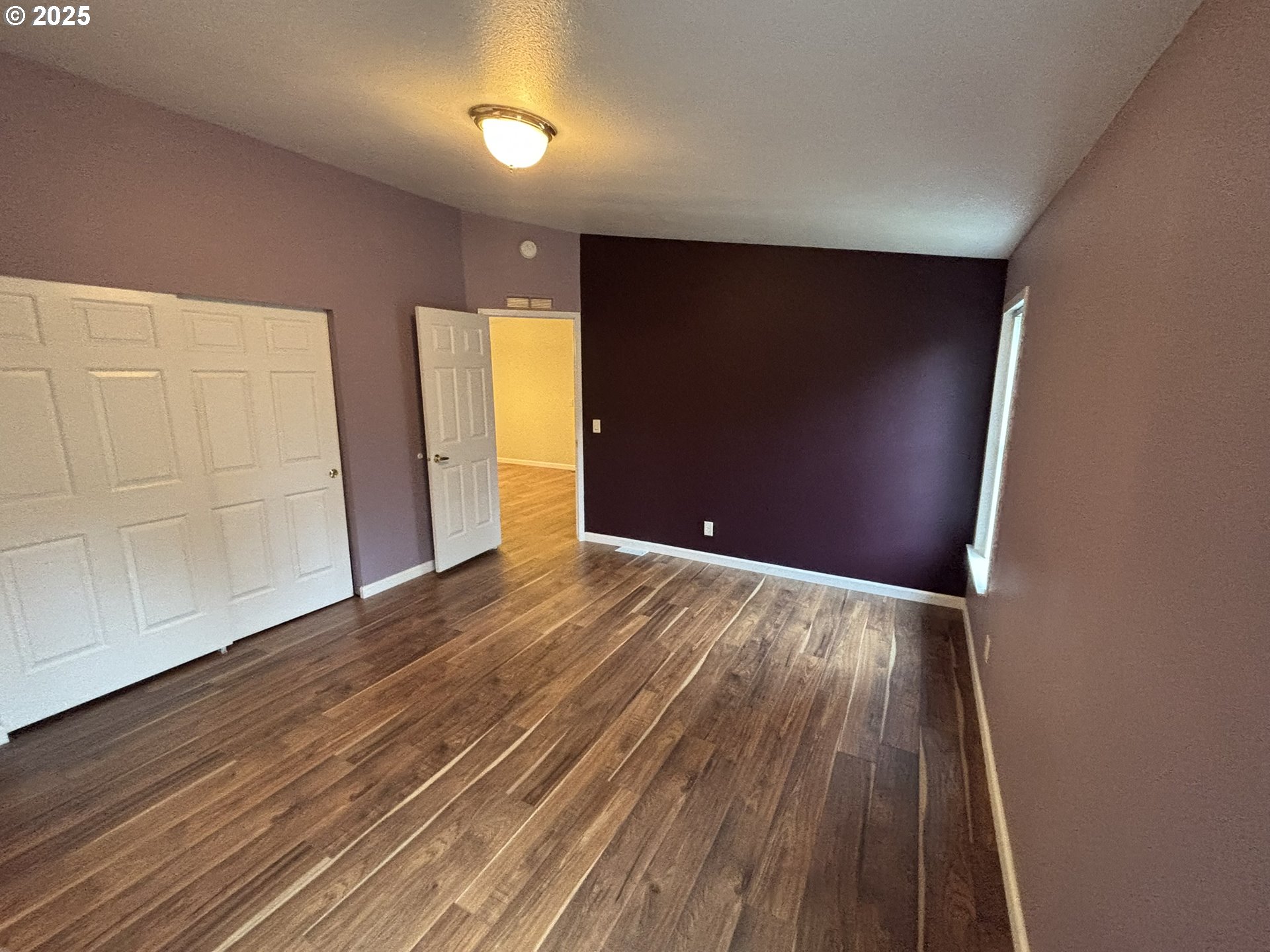 325 Jonathan Lane Florence, OR 97439 - Photo 17 of 37 a view of empty room with wooden floor
