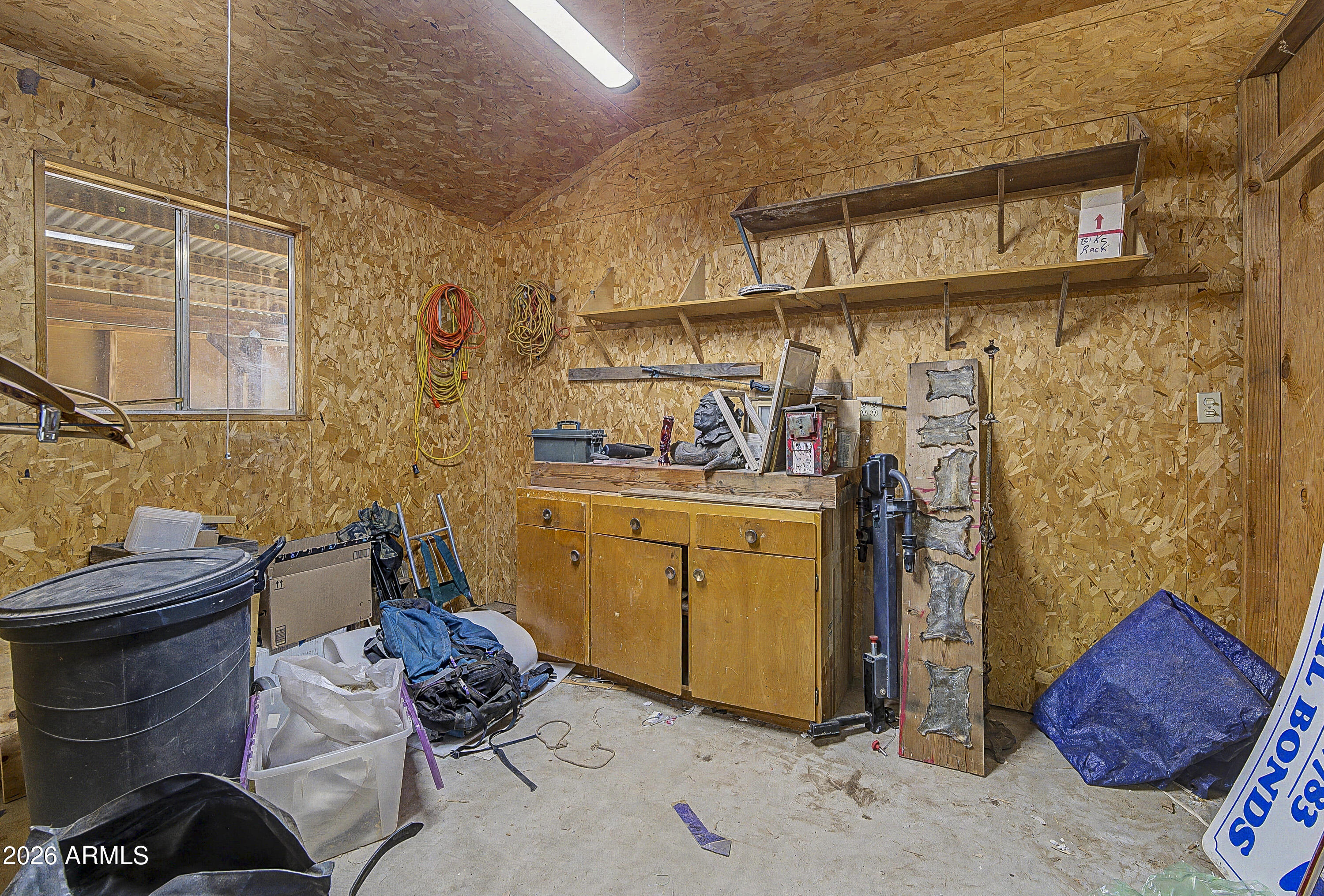 633 Oasis Road Camp Verde, AZ 86322 - Photo 23 of 50 a storage room with storage