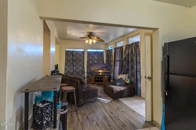 813 West Broadway Street Needles, CA 92363 - Photo 5 of 27 a view of a livingroom with furniture and storage