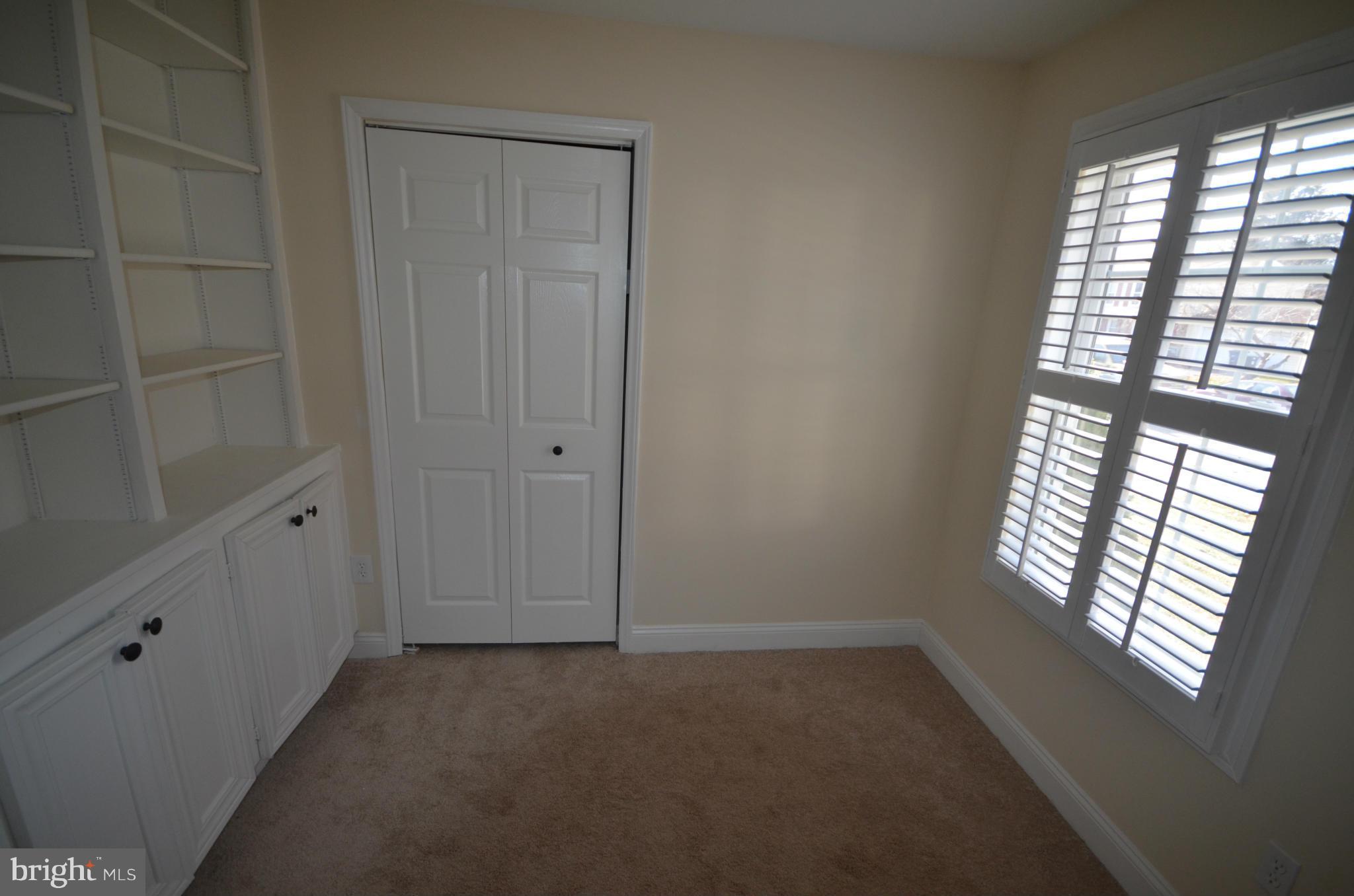 6405 Darwin Road Laurel, MD 20707 - Photo 11 of 20 an empty room with windows