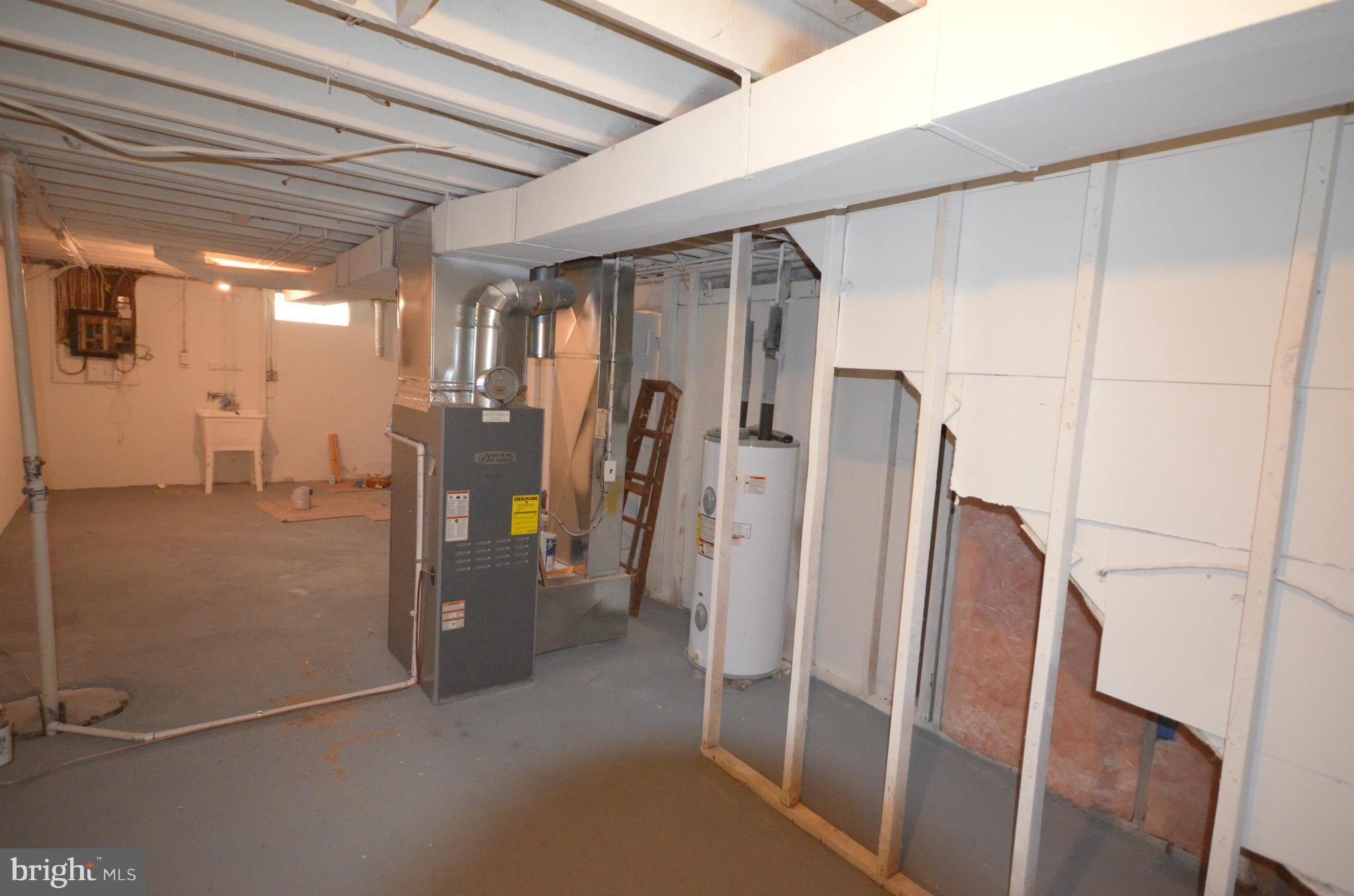 6405 Darwin Road Laurel, MD 20707 - Photo 16 of 20 a view of water heater room