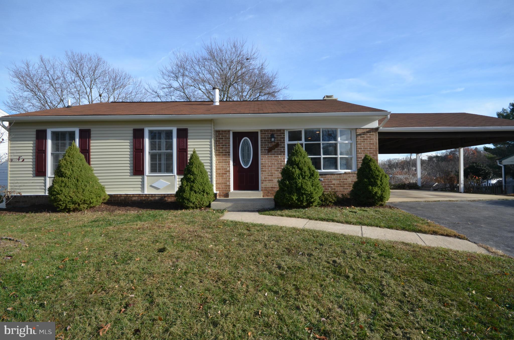 6405 Darwin Road Laurel, MD 20707 - Photo 20 of 20 a front view of a house with garden
