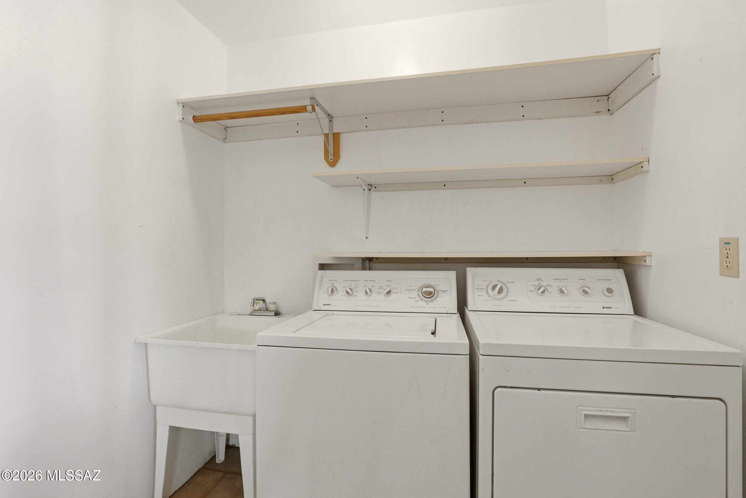 10855 West Mile Wide Road Tucson, AZ 85743 - Photo 35 of 47 Laundry Closet