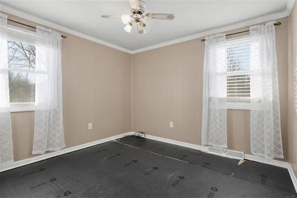 an empty room with windows