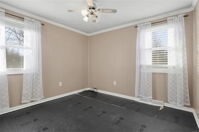 an empty room with windows