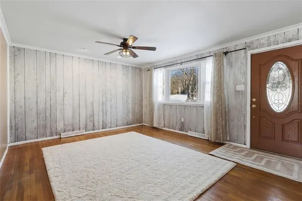 wooden floor in a hall with an entryway