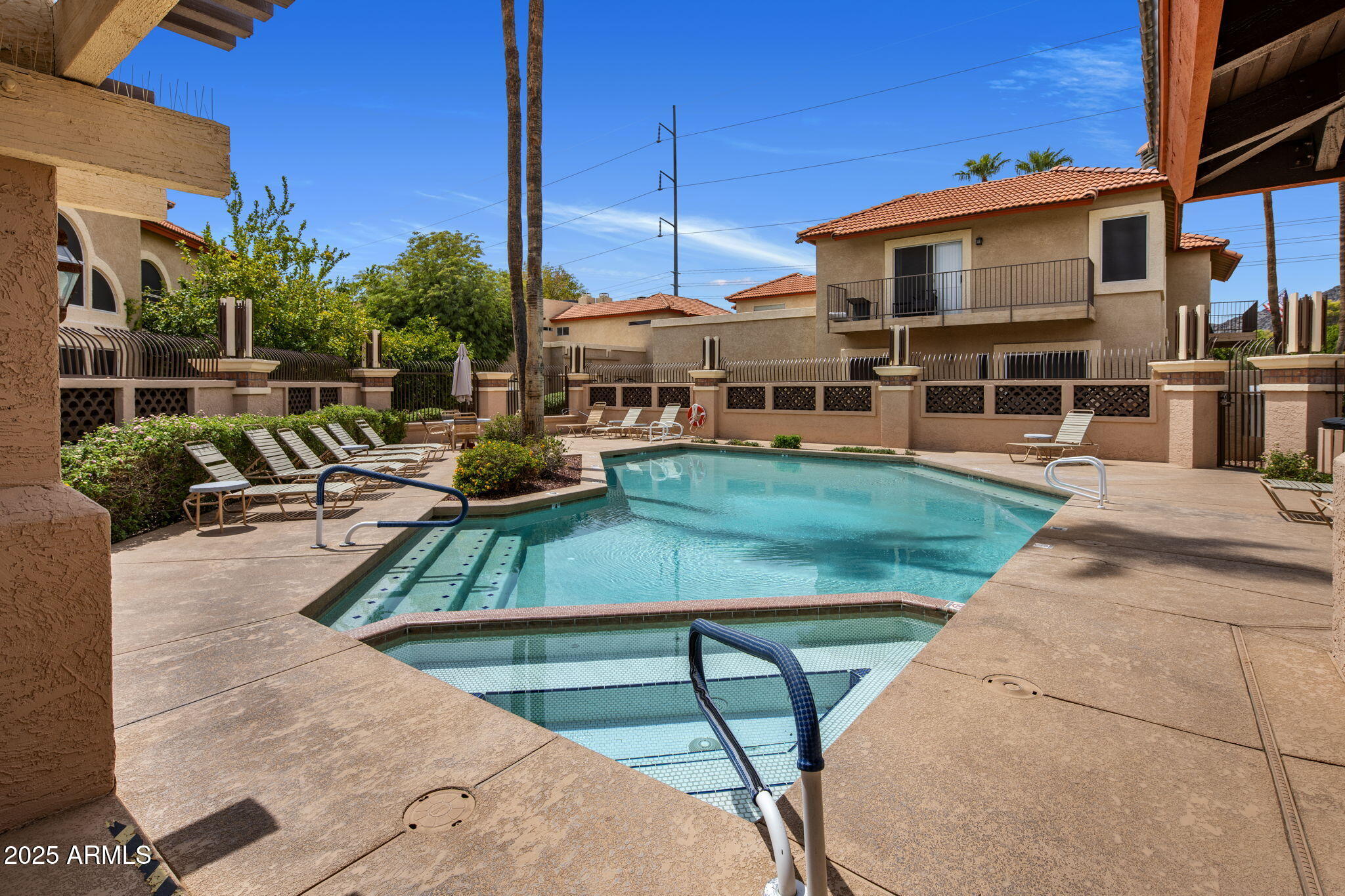 10410 North Cave Creek Road, Unit 1115 Phoenix, AZ 85020 - Photo 15 of 19 a view of a swimming pool with a patio