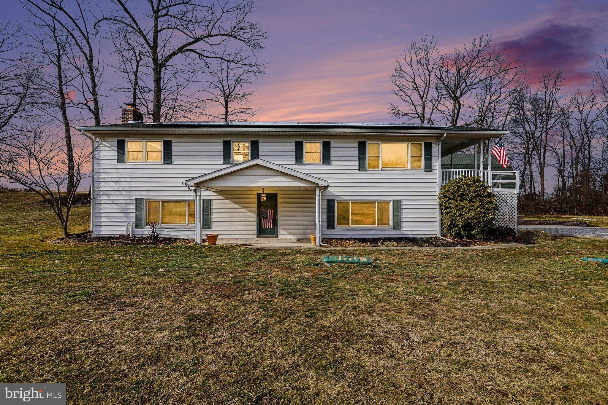 5405 West Canal Road East Berlin, PA 17316 - Photo 1 of 45 a front view of a house with garden