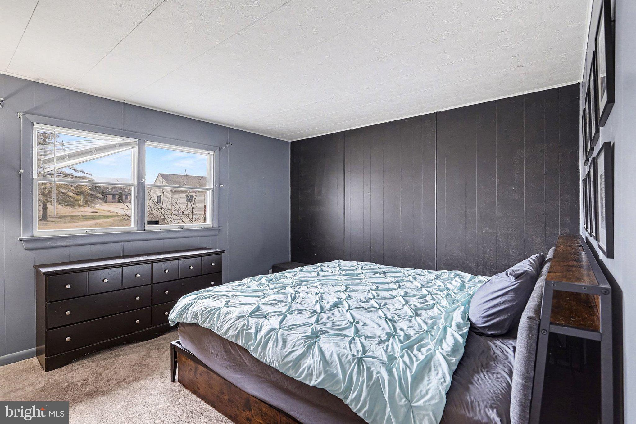 5405 West Canal Road East Berlin, PA 17316 - Photo 19 of 45 a bedroom with a bed and wooden floor