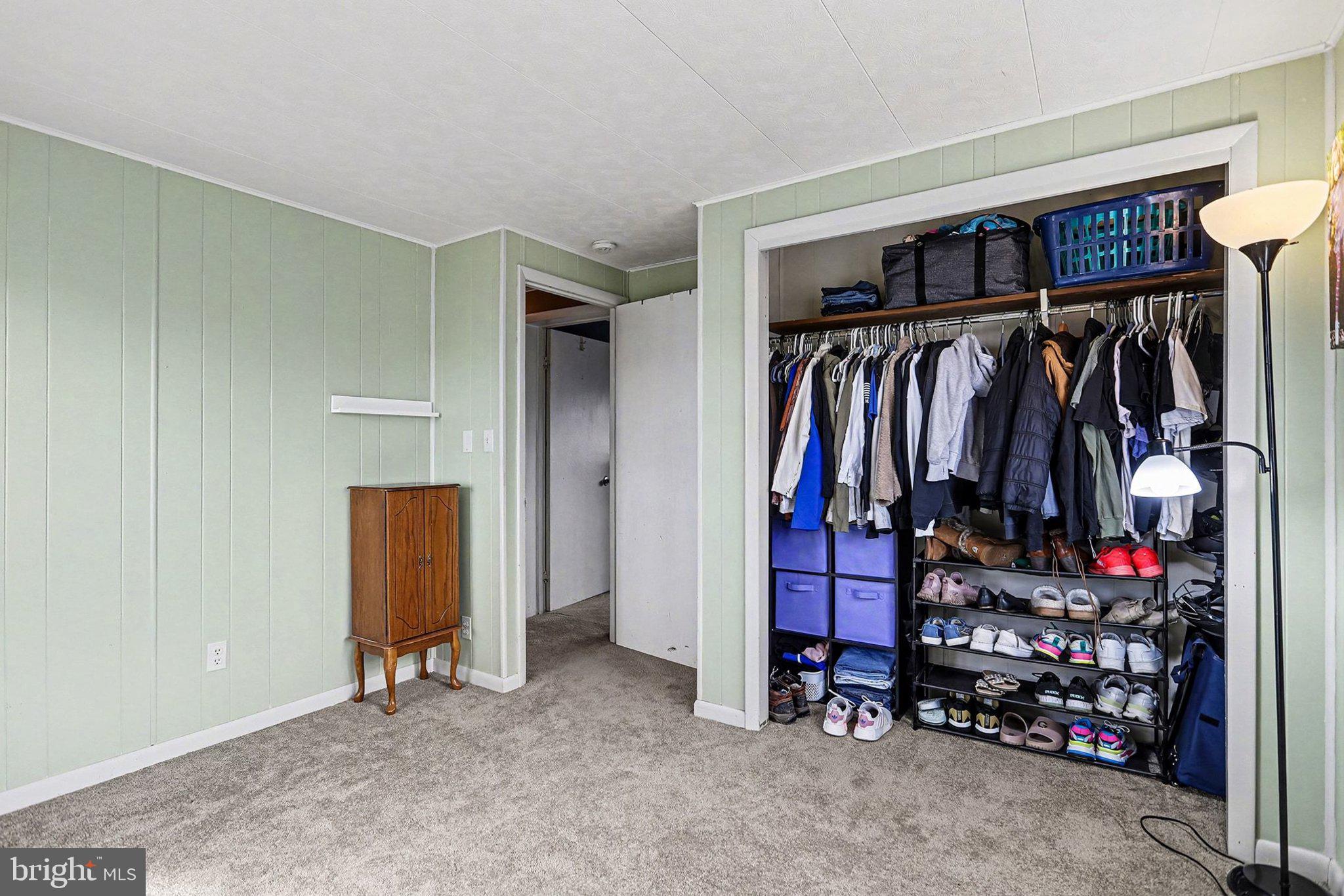 5405 West Canal Road East Berlin, PA 17316 - Photo 22 of 45 a view of walk in closet with clothes and shoes