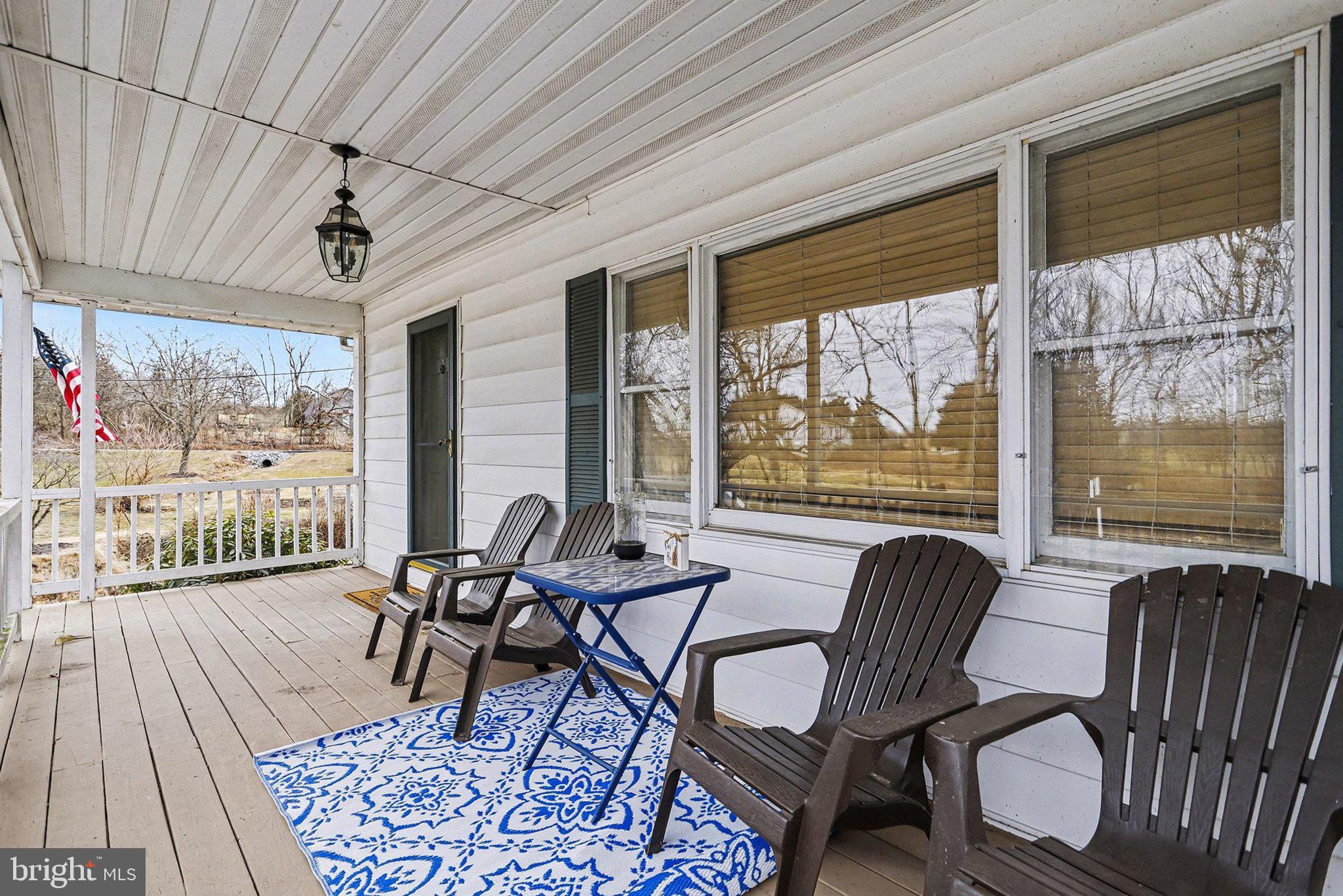 5405 West Canal Road East Berlin, PA 17316 - Photo 3 of 45 a living room with furniture and a floor to ceiling window