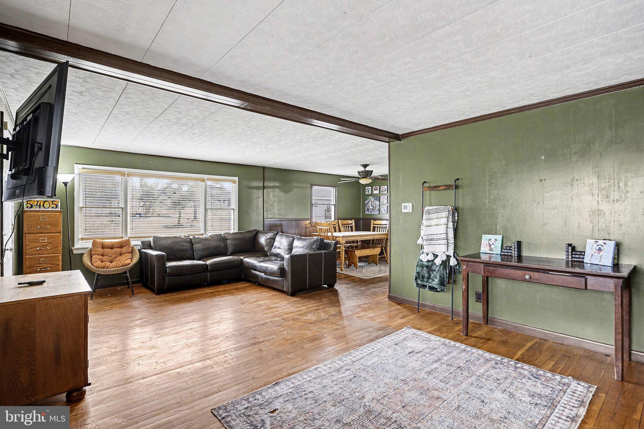 5405 West Canal Road East Berlin, PA 17316 - Photo 7 of 45 a living room with furniture and a table