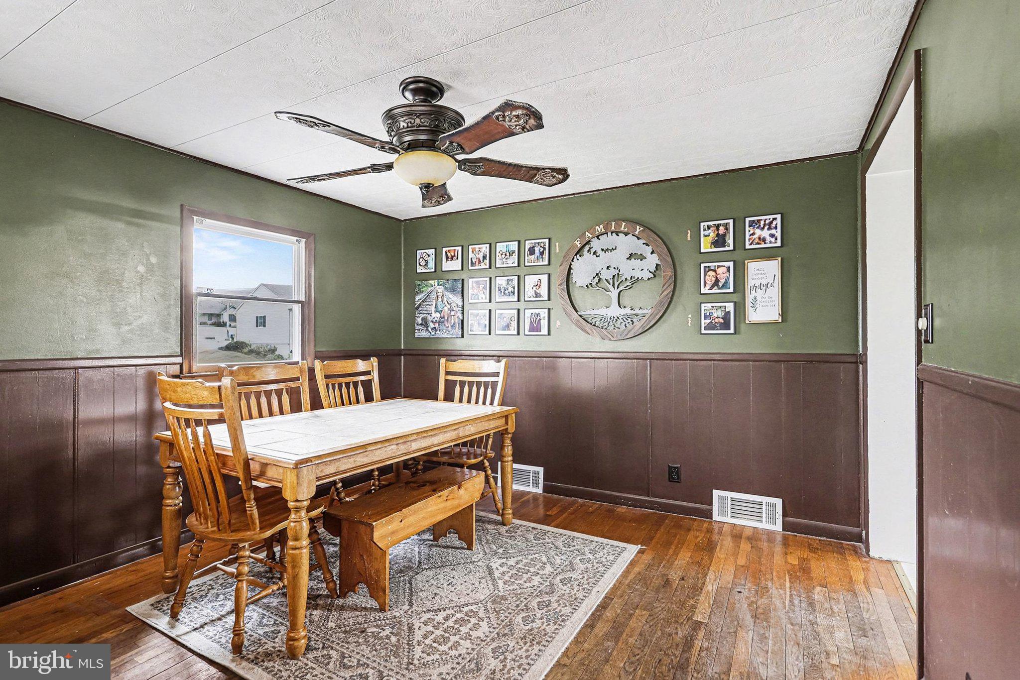 5405 West Canal Road East Berlin, PA 17316 - Photo 9 of 45 a view of a dining room with furniture window and wooden floor