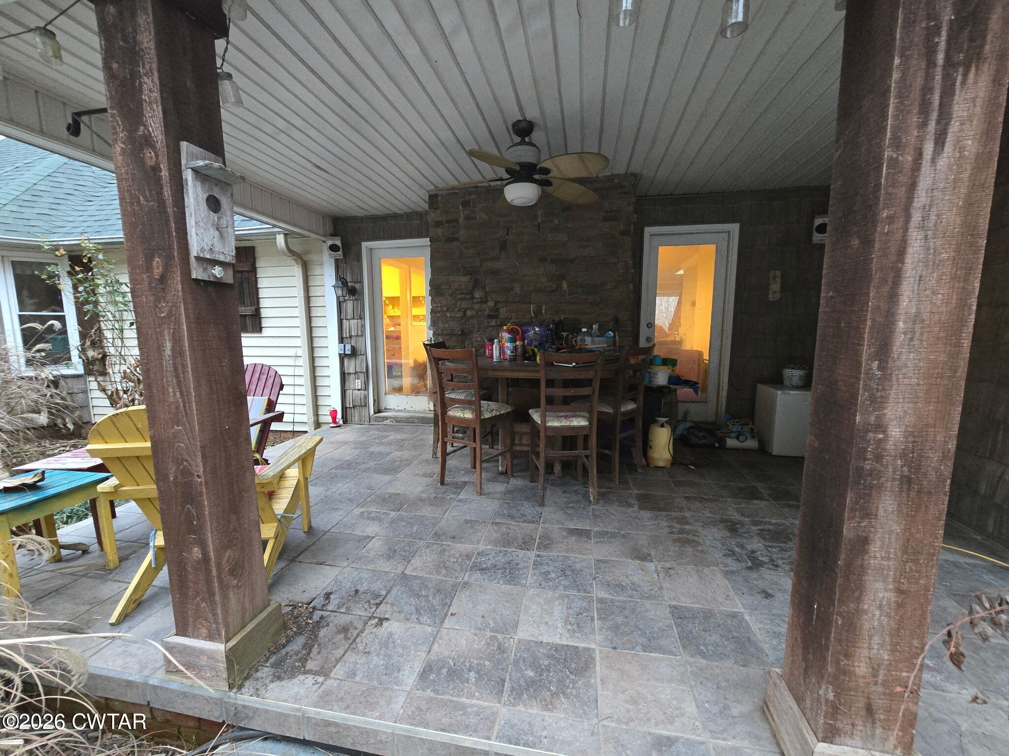 701 Deep Gap Road Jackson, TN 38301 - Photo 2 of 3 a view of a porch with chairs and potted plants